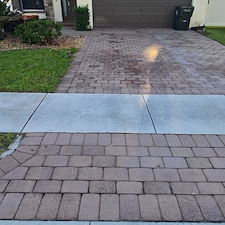 Pressure-Washing-Driveway-Oil-Stain-and-paint-removal-from-paver-driveway-located-at-Greenacres-FL-33415 0